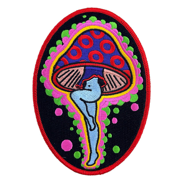 Colorful patch with a mushroom and abstract design on a black background