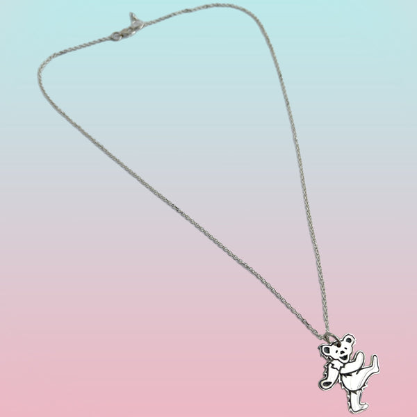 Necklace with a bear pendant on a gradient background
